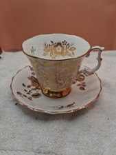 Royal Albert Bone China Tea Cup And Saucer , England . Gold And White picture