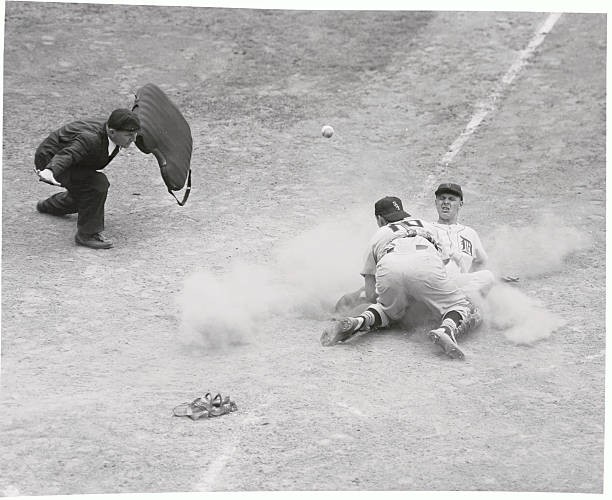 Tiger Jim Delsing scores 1st base Ray Boone\'s double left field du- Old Photo