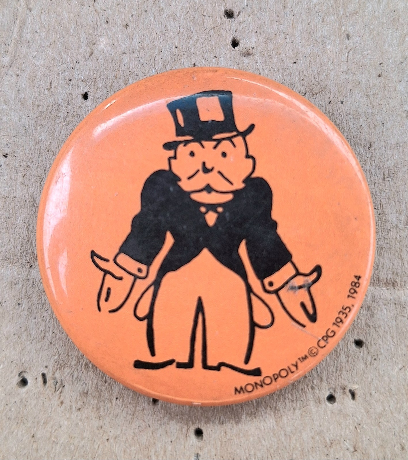 Vintage 1984 American Greetings Pin Back Button Monopoly Game Orange 