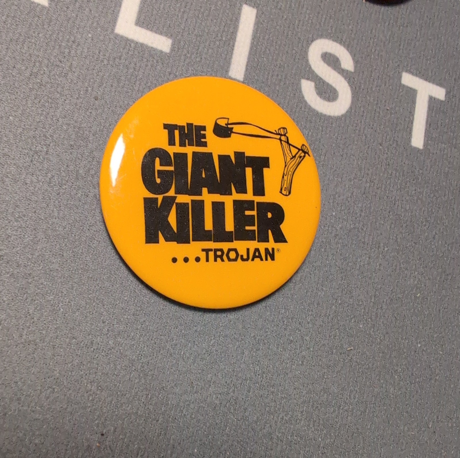 Vintage Trojan Condoms The Giant Killer Slingshot Advertising Pinback Button
