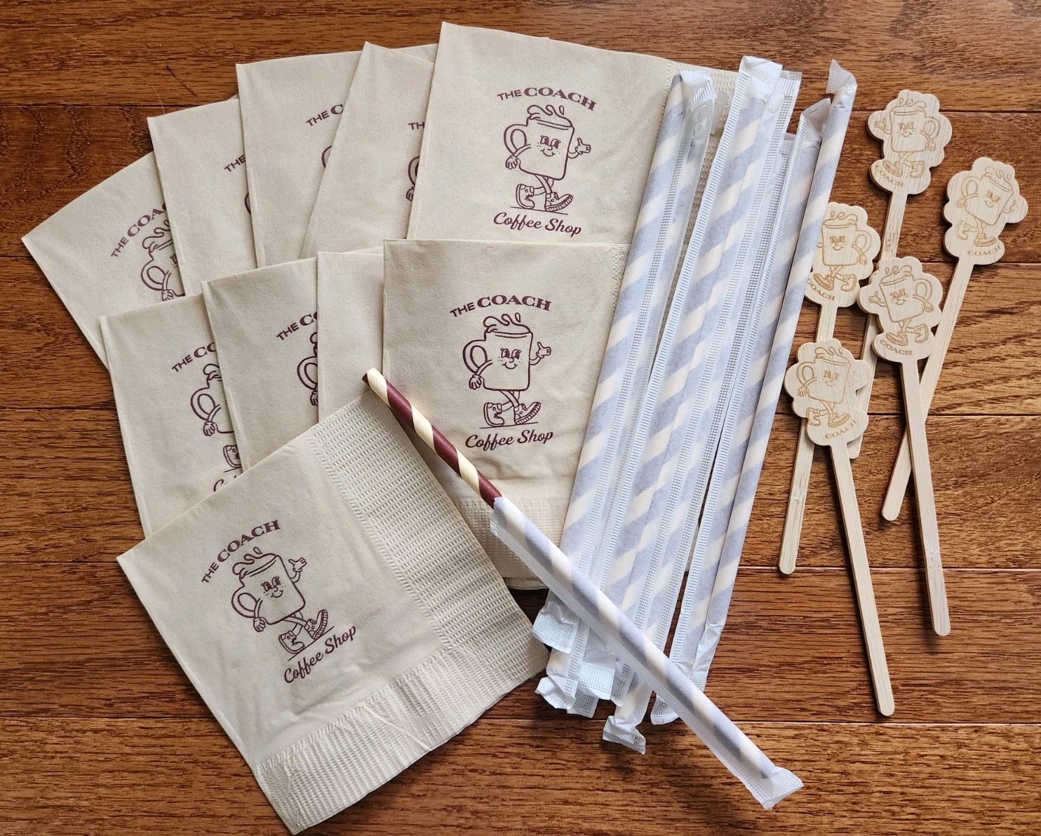 The Coach Coffee Shop Coffee Stirrers, Napkins,Straws w/Logo part of COACH brand