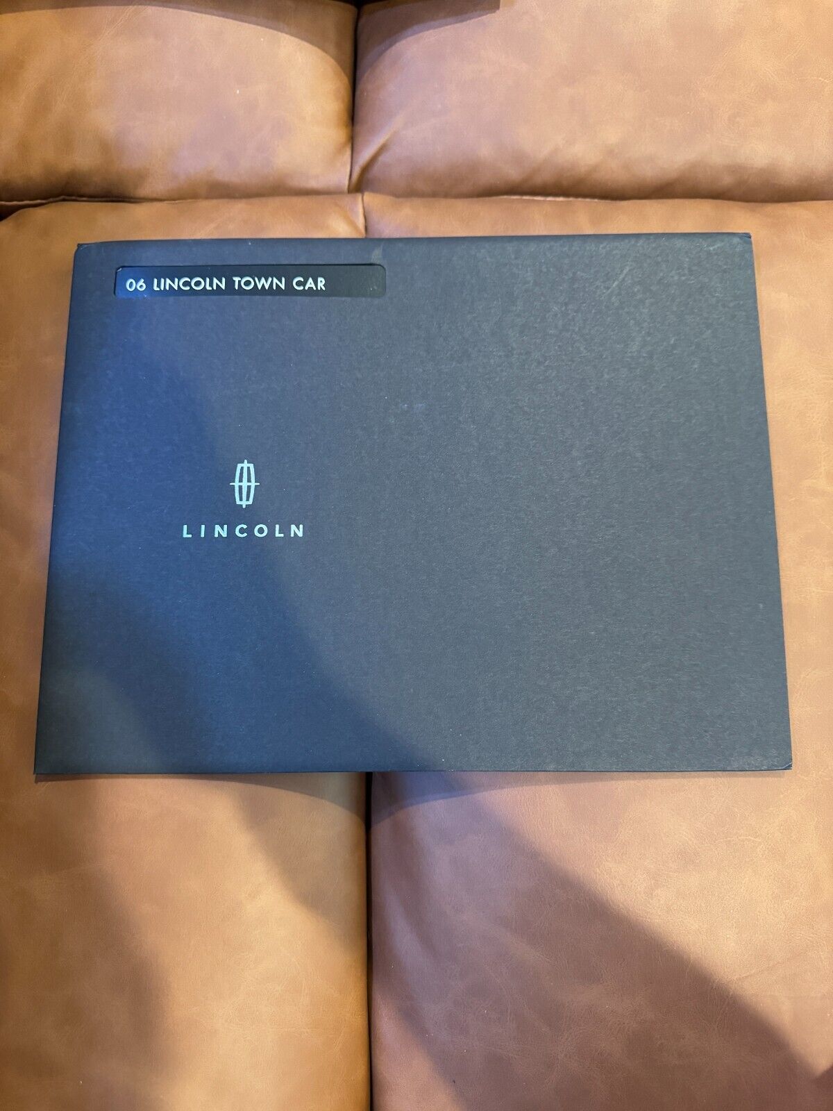 2006 Lincoln Town Car sales brochure sealed in envelope