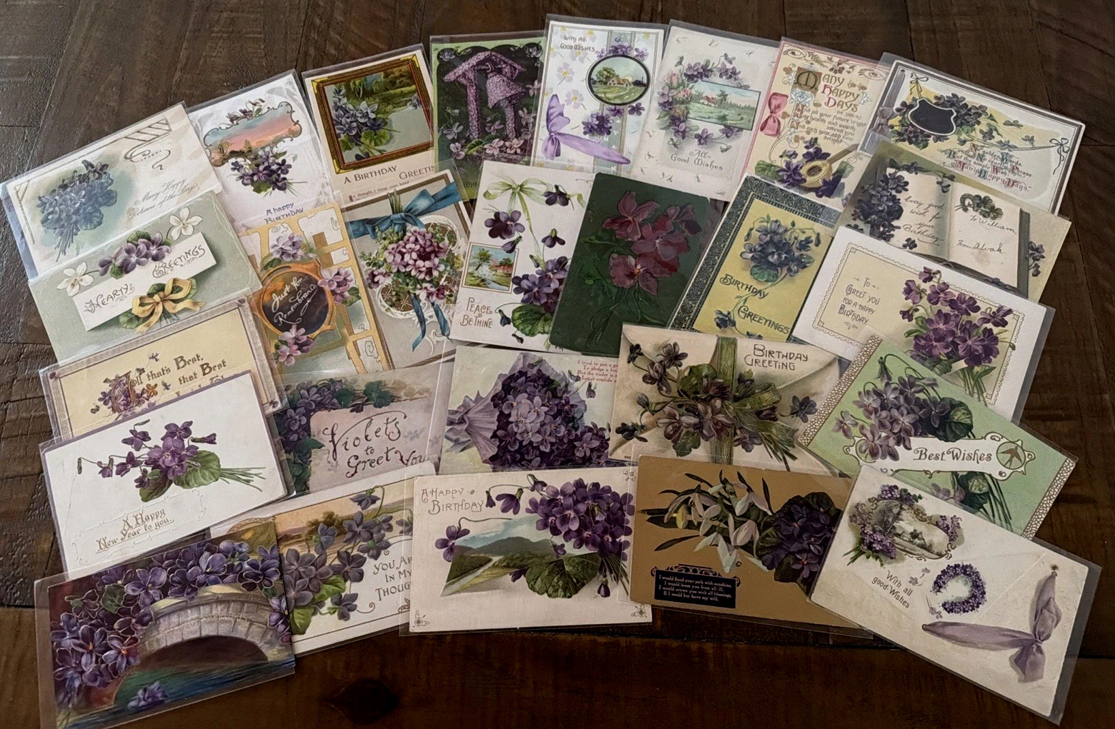 Nice~Lot of 25  Vintage~Greetings Postcards with Violets Flowers~in Sleeves~s498