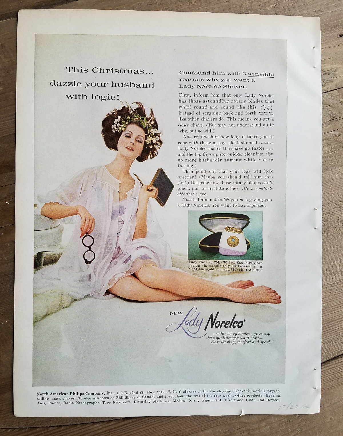 1962 lady Norelco shaving razor woman lingerie legs Dazzle your husband ad