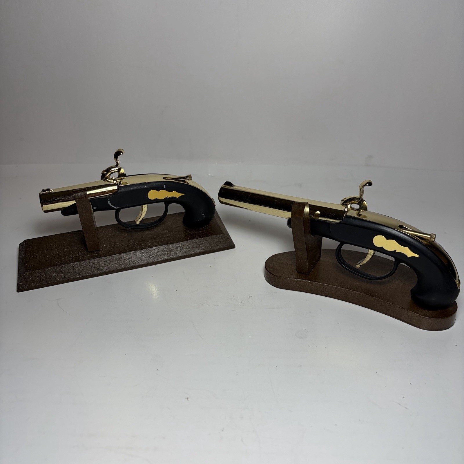 2 Vintage Flintlock Pistol-Shaped Lighters Made in Japan with Wooden Stands