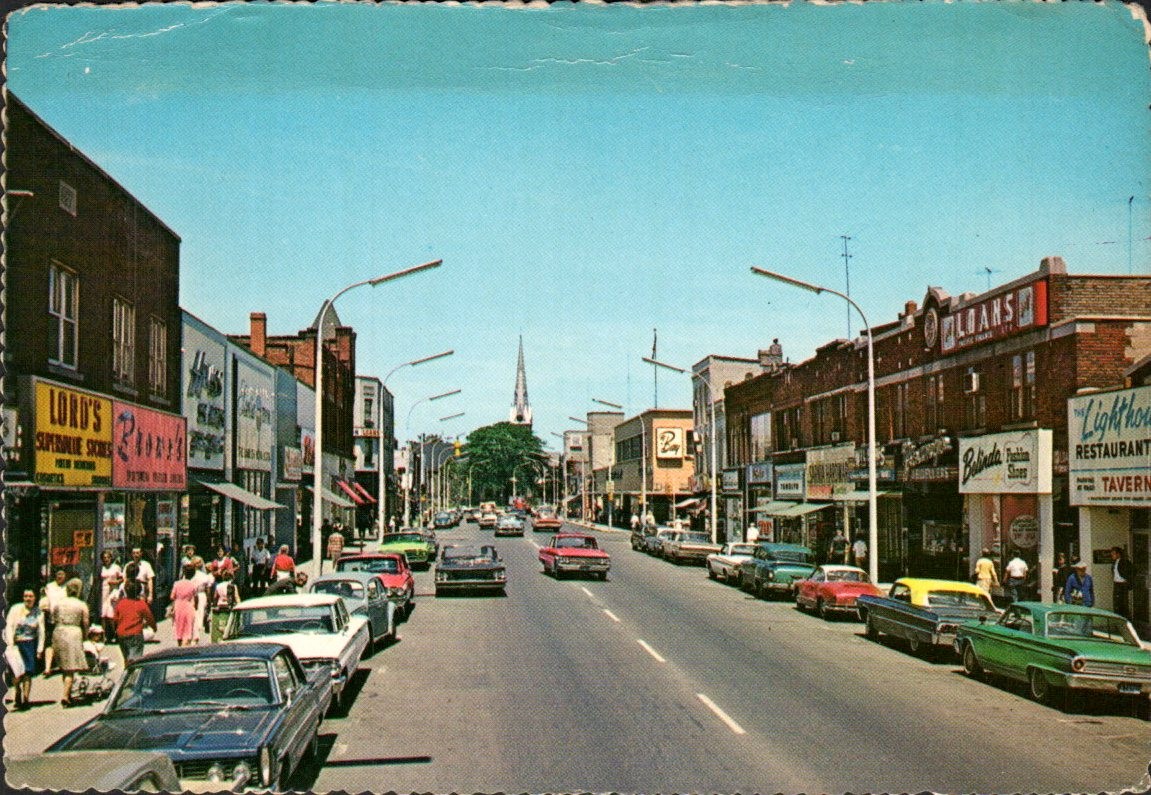 Sarnia Ontario - Christina Street with 1960s Cars and Shops - Postcard - c1965