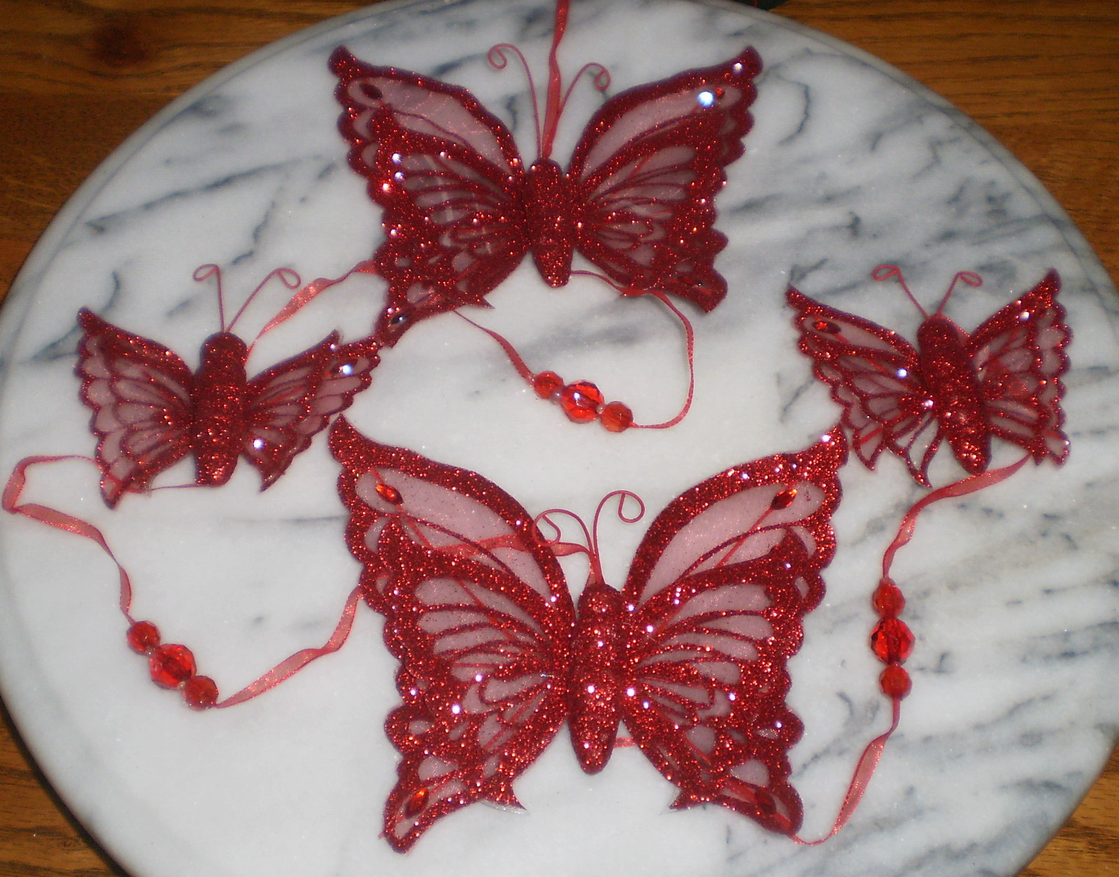 ~~ONE (1)  STRAND ~ BEAUTIFUL RED BUTTERFLY GARLAND~IMMEDIATE SHIPPING
