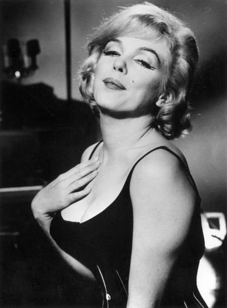 American film actress Marilyn Monroe during making film Lets Make - Old Photo