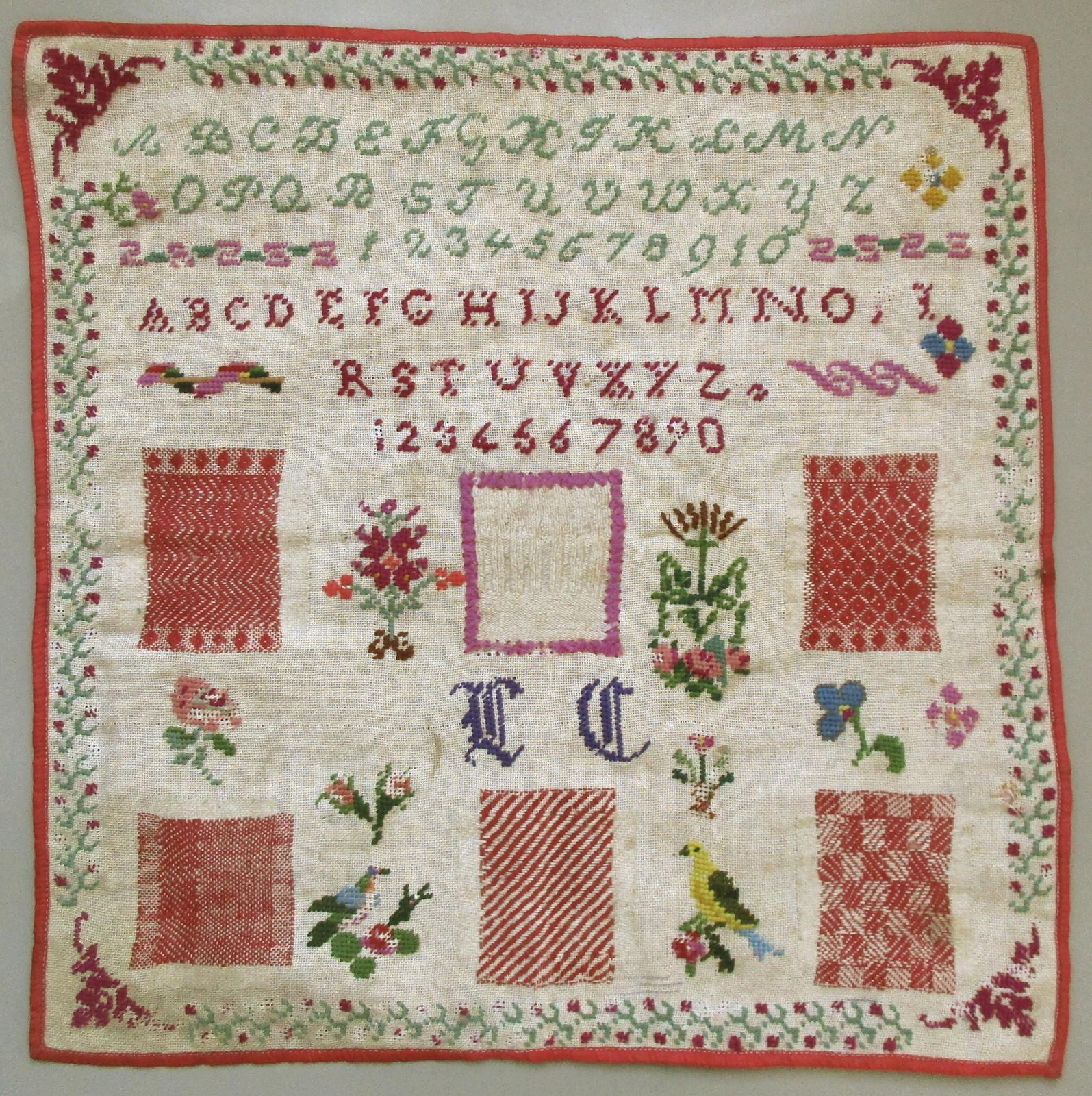 CIRCA 1890 ANTIQUE FRENCH WOOLWORK SAMPLER - CROSSTITCH & RED DARNING