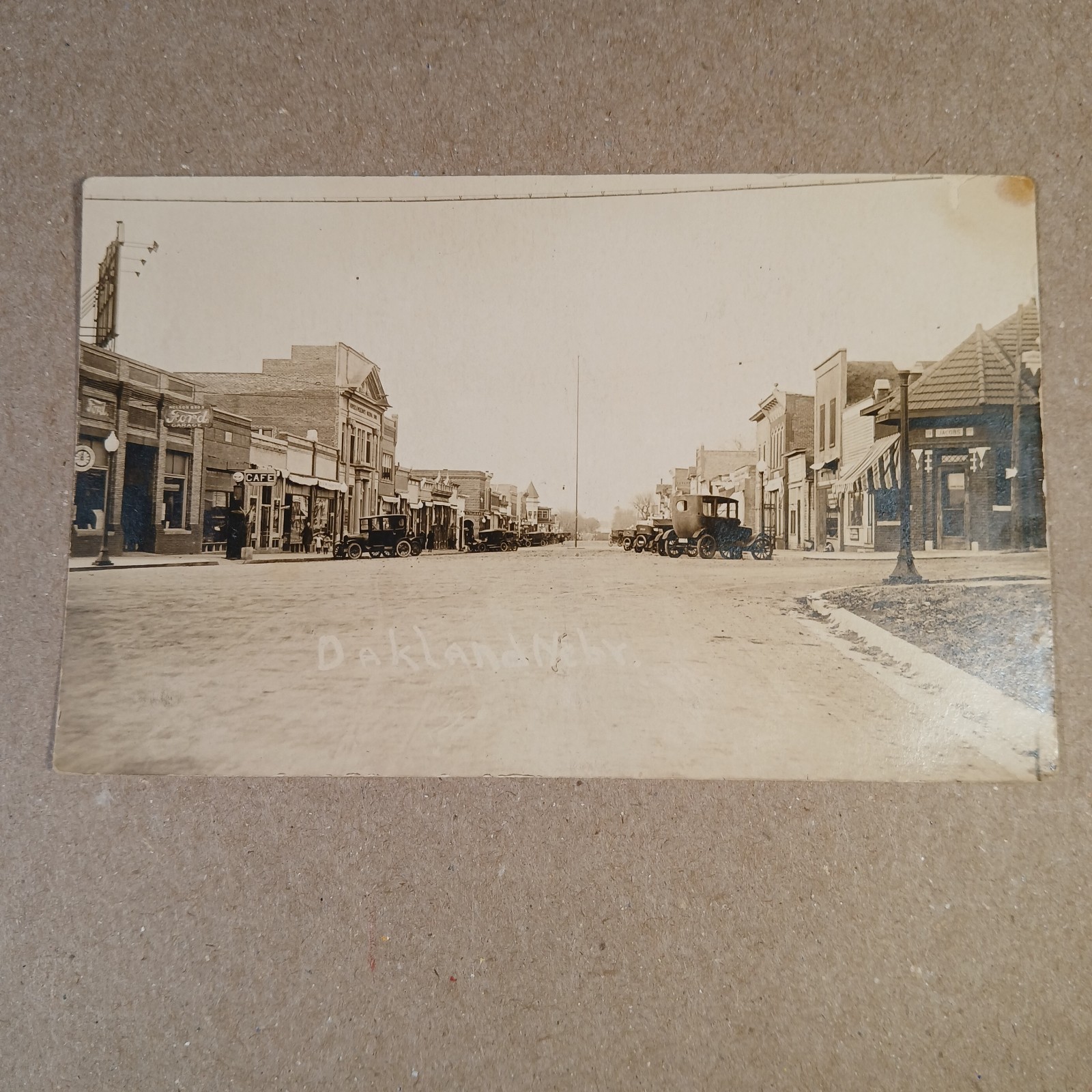 RPPC Oakland Nebraska Main Street Circa 1920's Postcard Ford Motors Cars