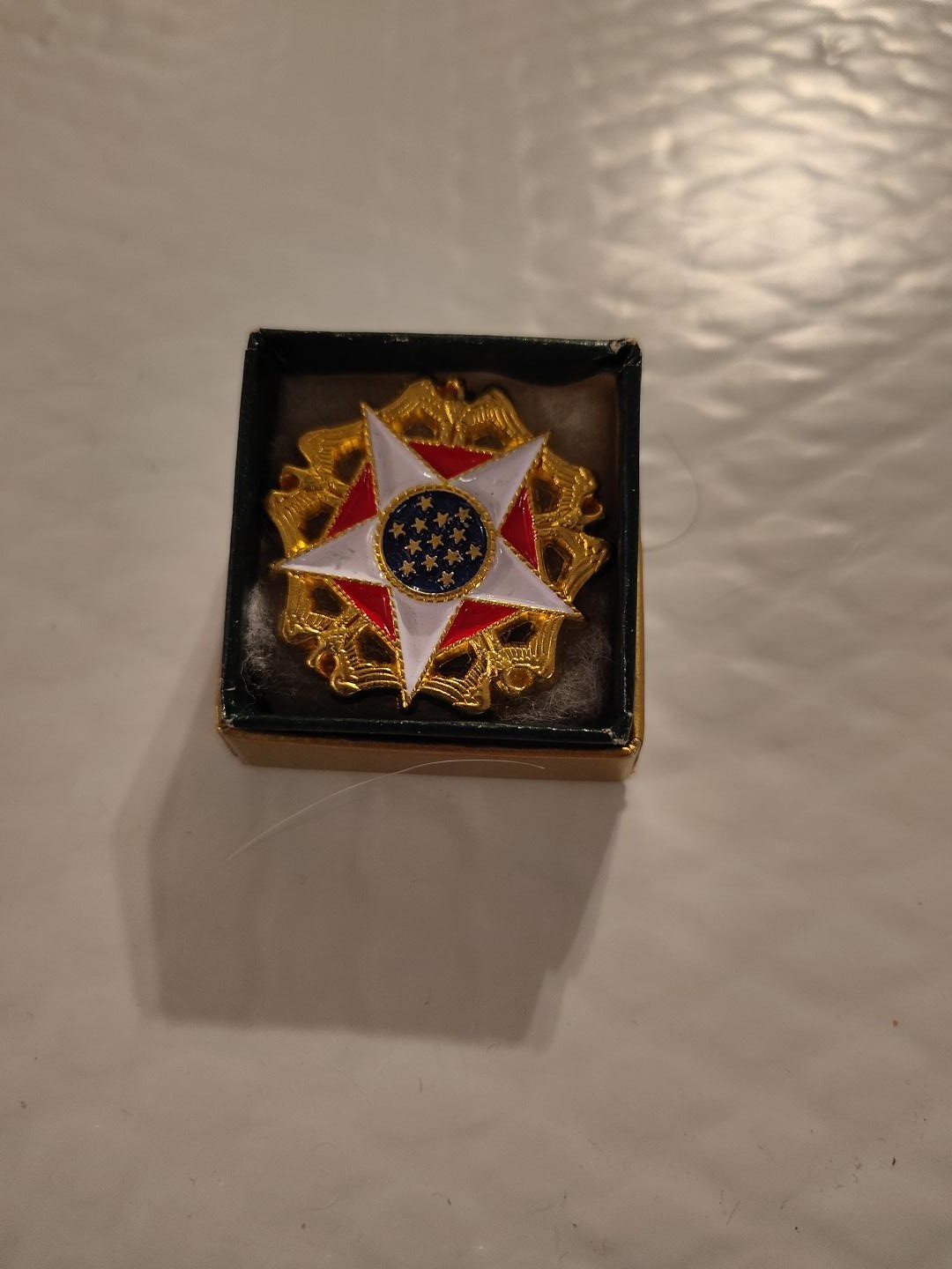 Here is a striking vintage patriotic award badge presented in a period Kerr...