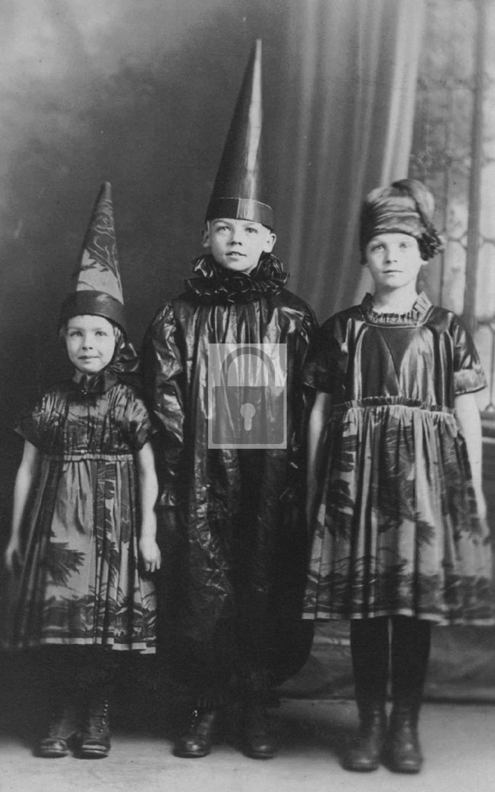 Three Children In Halloween Costumes - Reprint