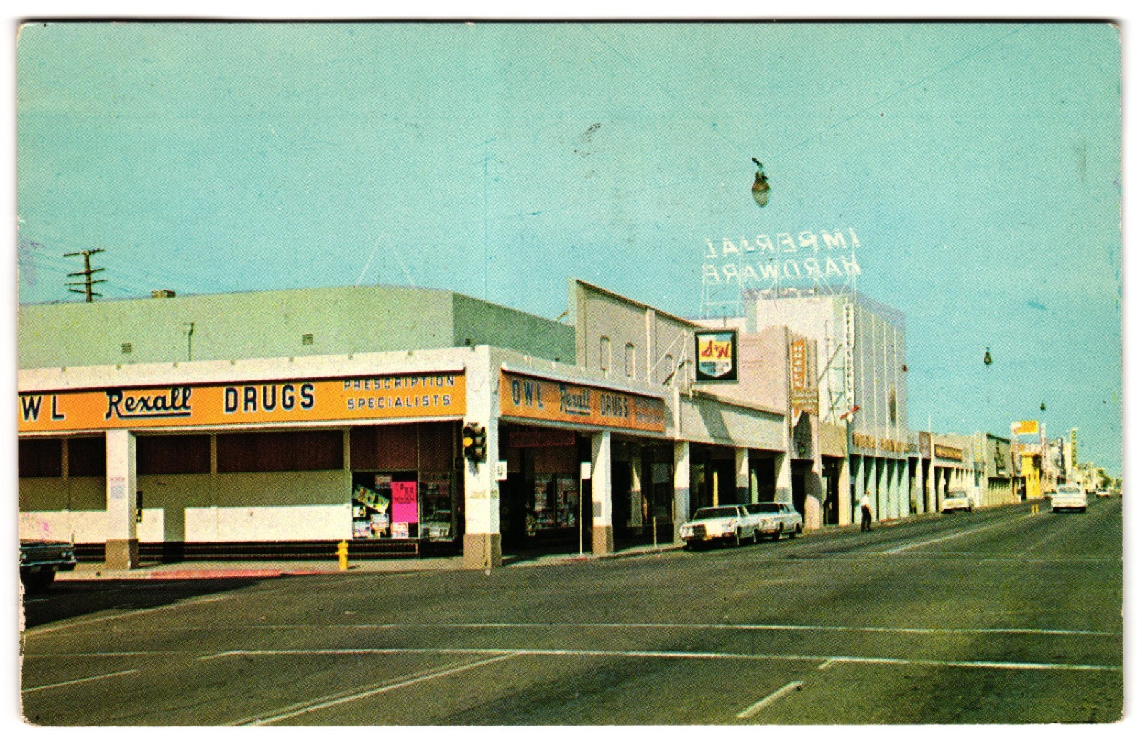 Main Street El Centro California Rexall Drugs Imperial Hardware c1960s Postcard