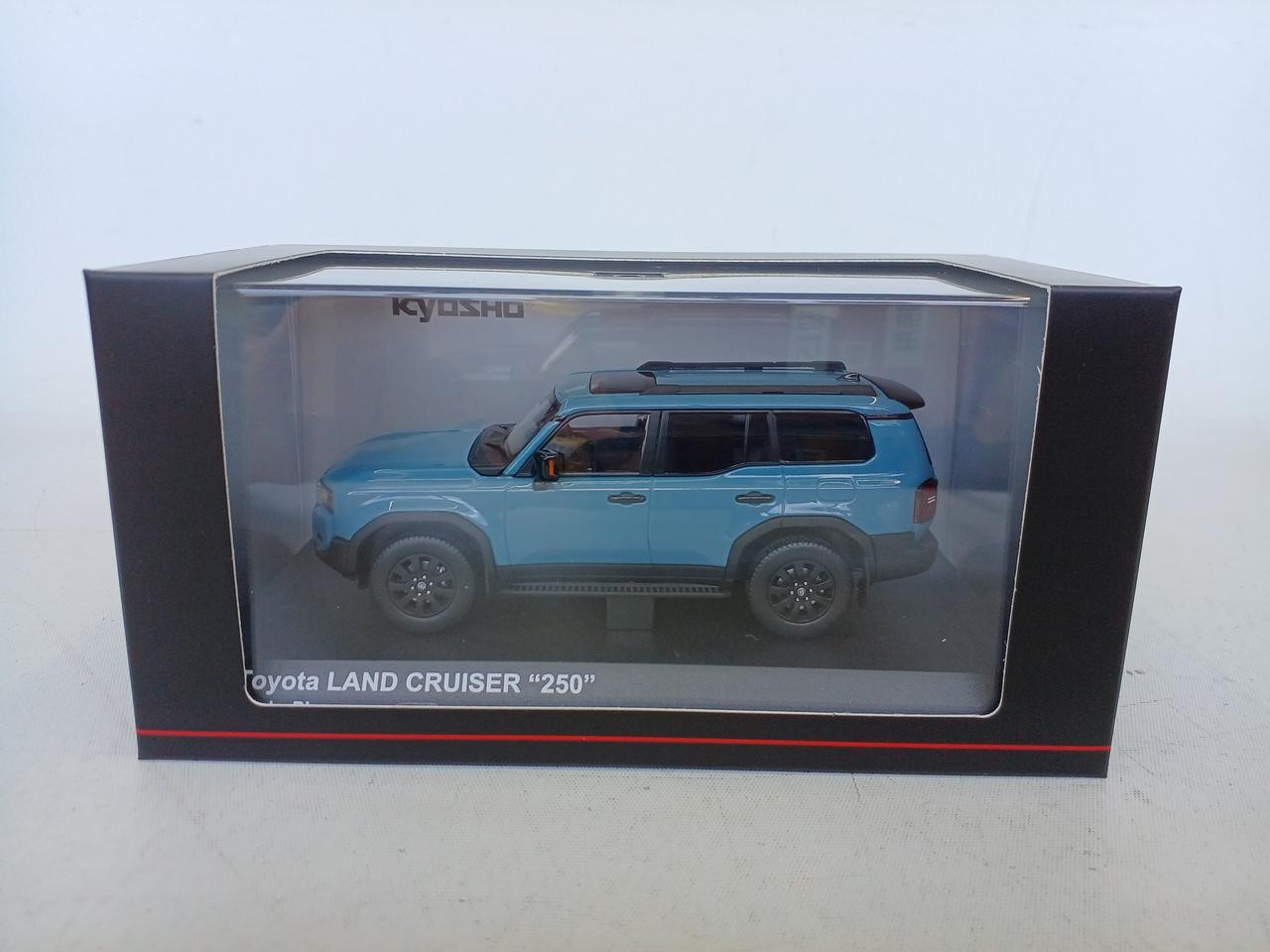 Kyosho Smokey Blue Toyota Land Cruiser 250 1/18 Scale Model [Age 13+]
