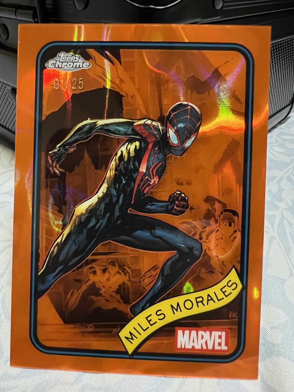 2025 Topps Chrome Marvel Miles Morales Orange Lava Refractor #1/25