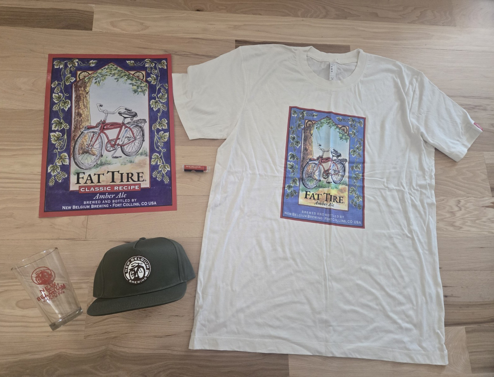 New Belgium Brewing Fat Tire Breweriana Lot: XL Tee, Hat, Pint Glass, Poster