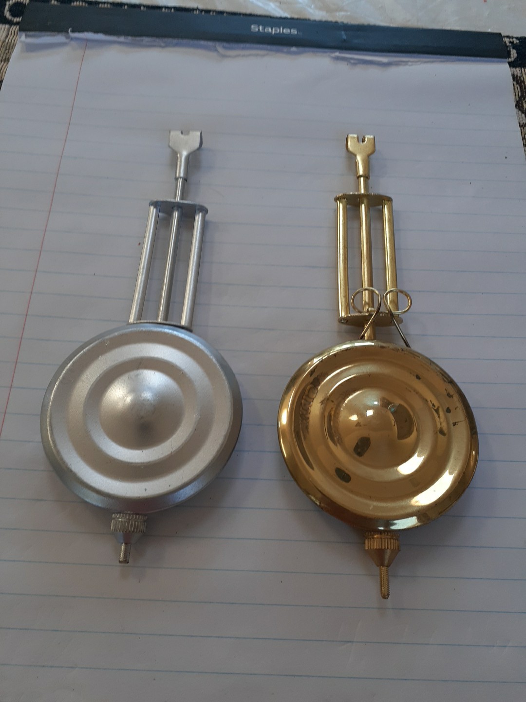A Pair Of Kitchen Clock Pendulum Reproductions