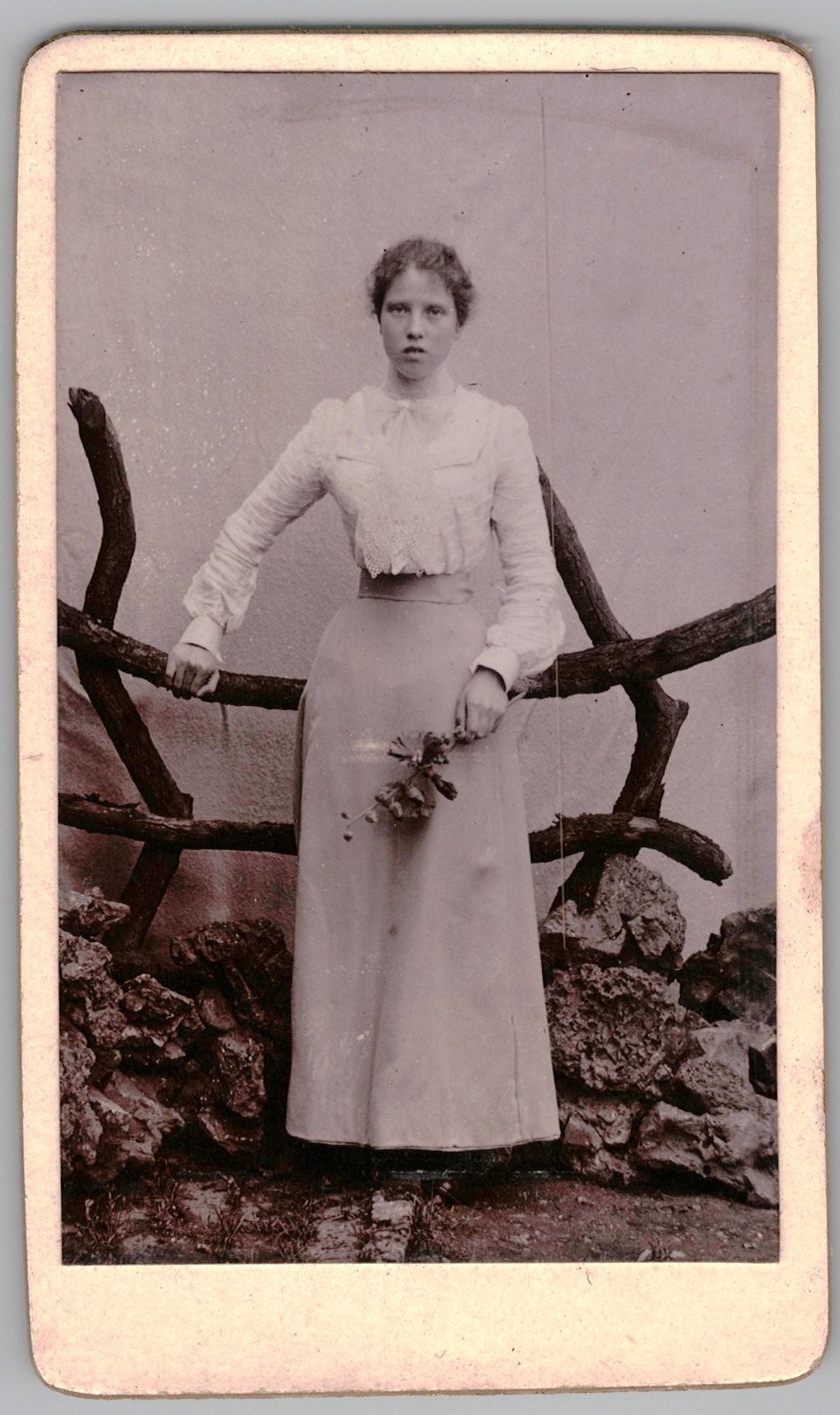 Antique CDV 1890s Young Woman White Blouse Long Skirt Holding Flower Prop