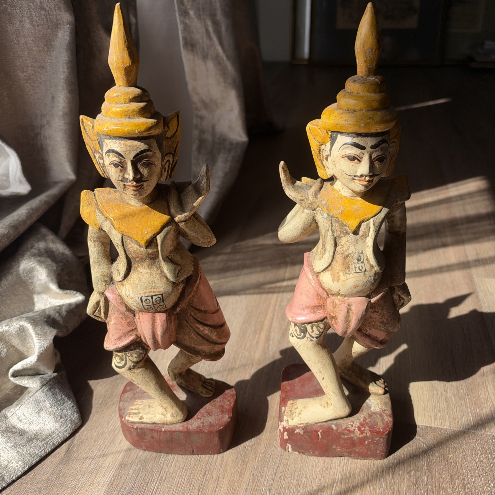A Pair of Carved Wooden Figures (Likely A Burmese Nat Spirit Or A Celestial Sun)