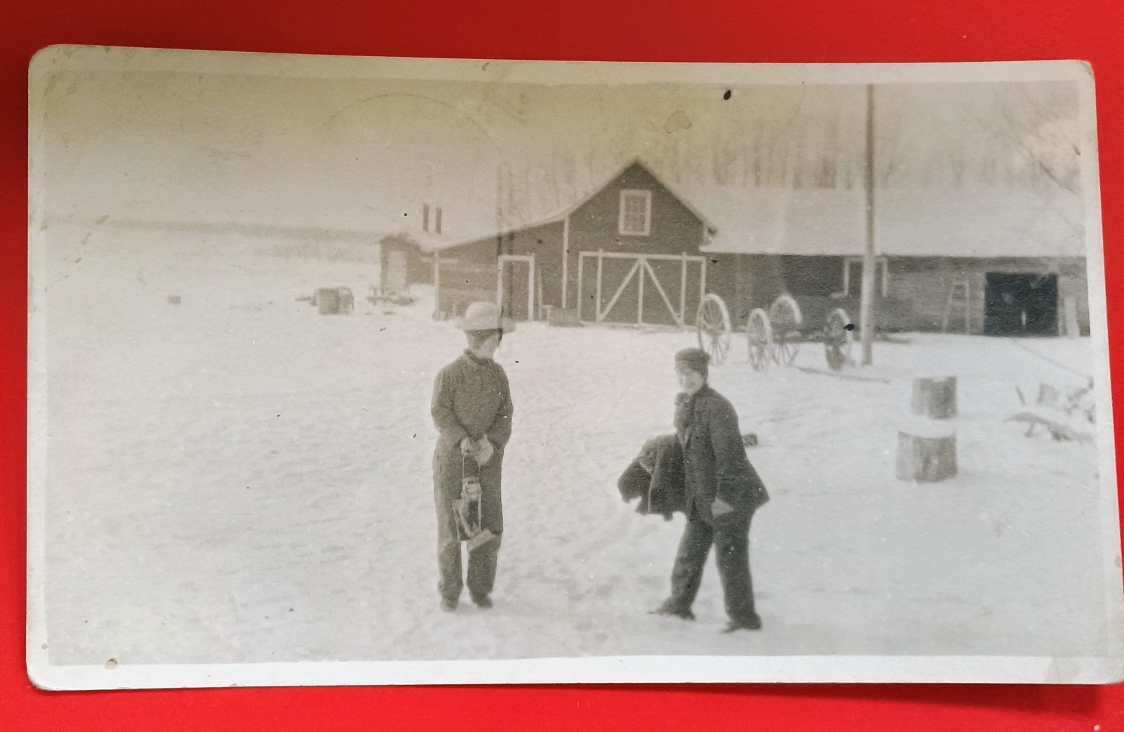 RPPC Thief River Falls Minnesota Two Woman Pose In Front Of Barn Scene Winter