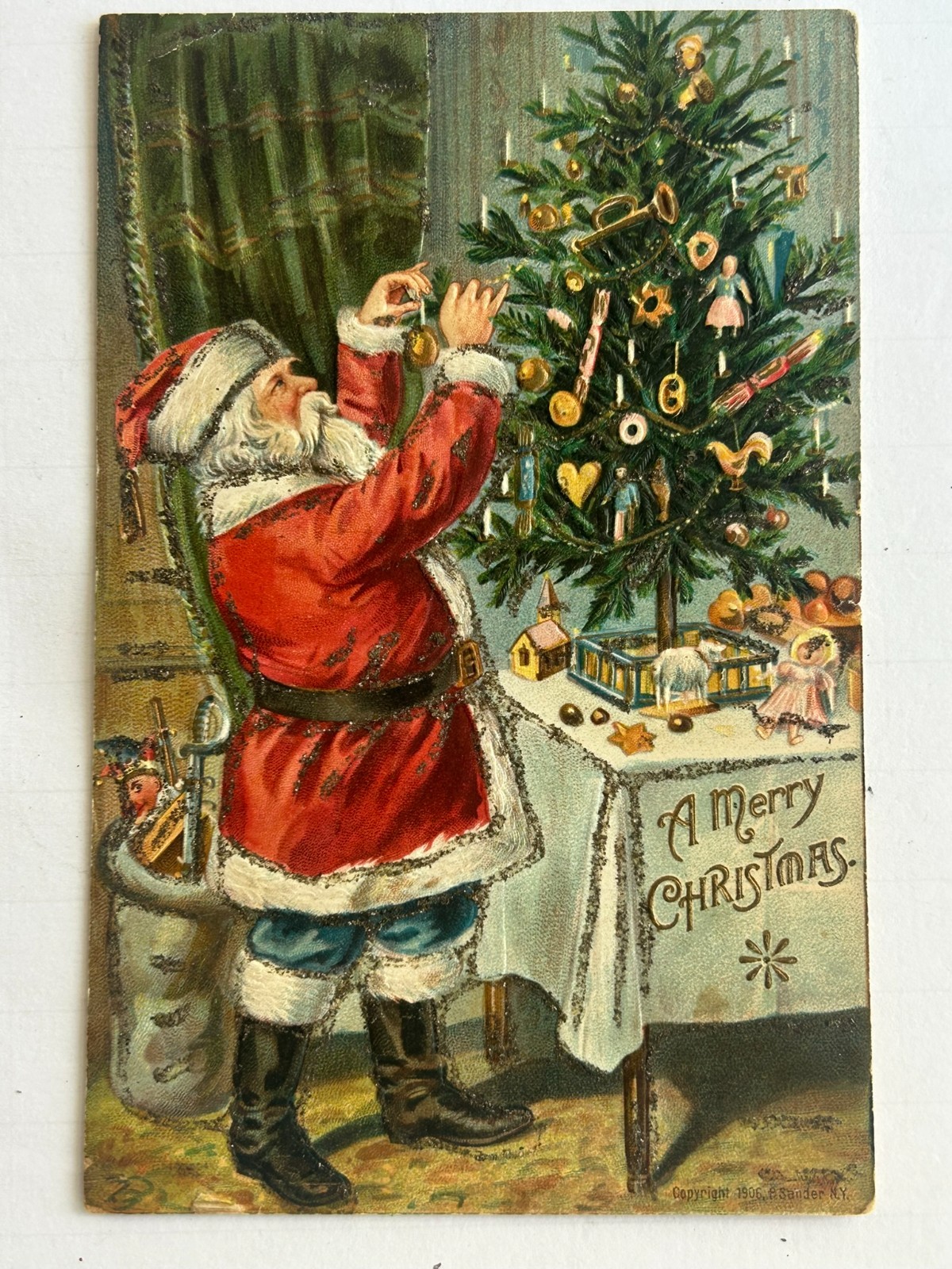 Antique 1906? Christmas Santa Postcard I.P.C. Publisher Glitter Undivided Used