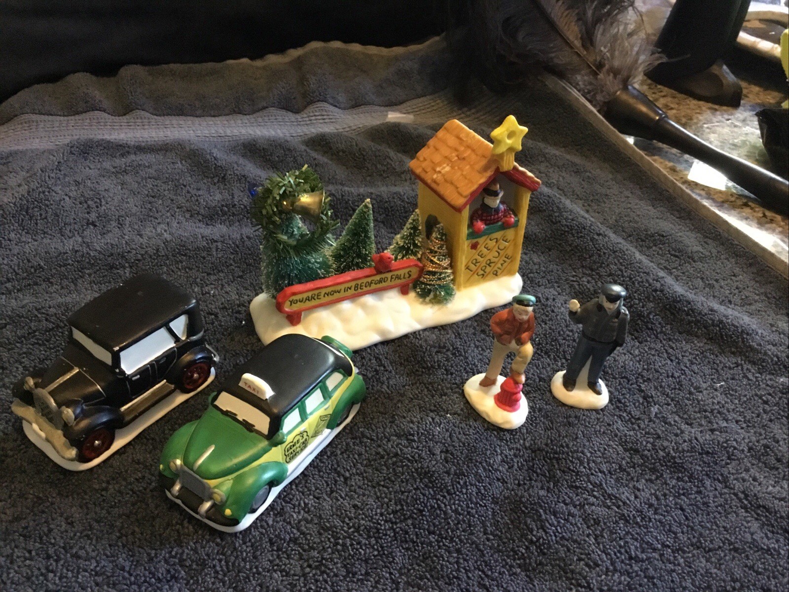 A wonderful Bedford Falls tree stand, Bert and Ernie figurines, taxi cab, car￼