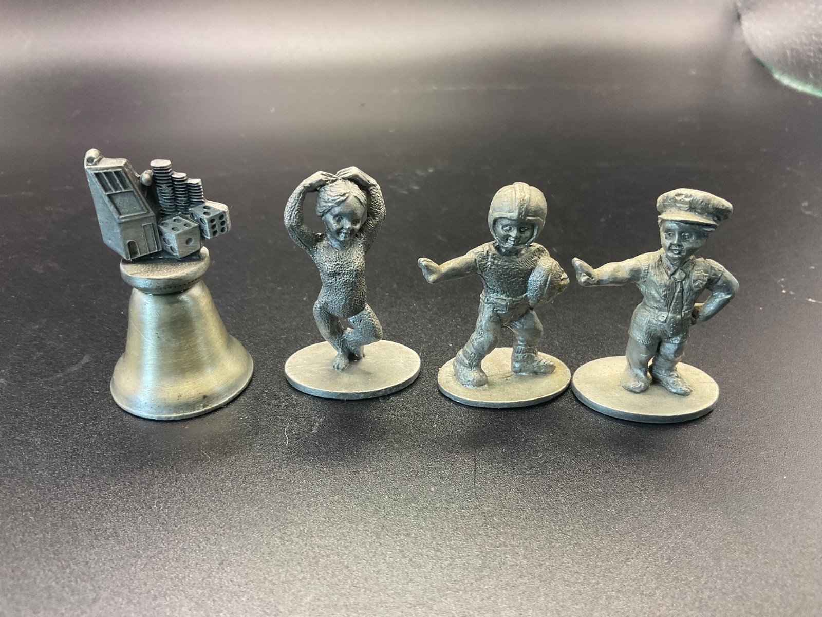 spoontiques pewter figurines and a bell