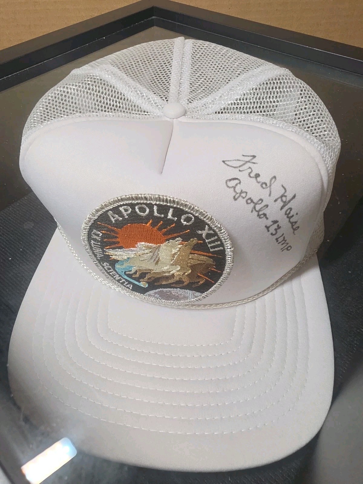 FRED HAISE Autographed Apollo 13 Hat. SIGNED NASA TRUCKER STYLE CAP (FRAMED)