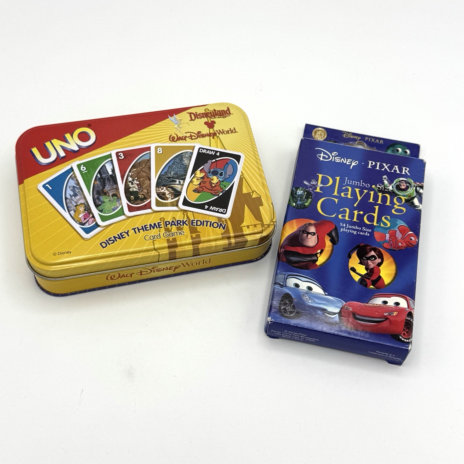 NEW Disney Parks UNO Game Theme Park Edition In Tin + Pixar Jumbo Playing Cards
