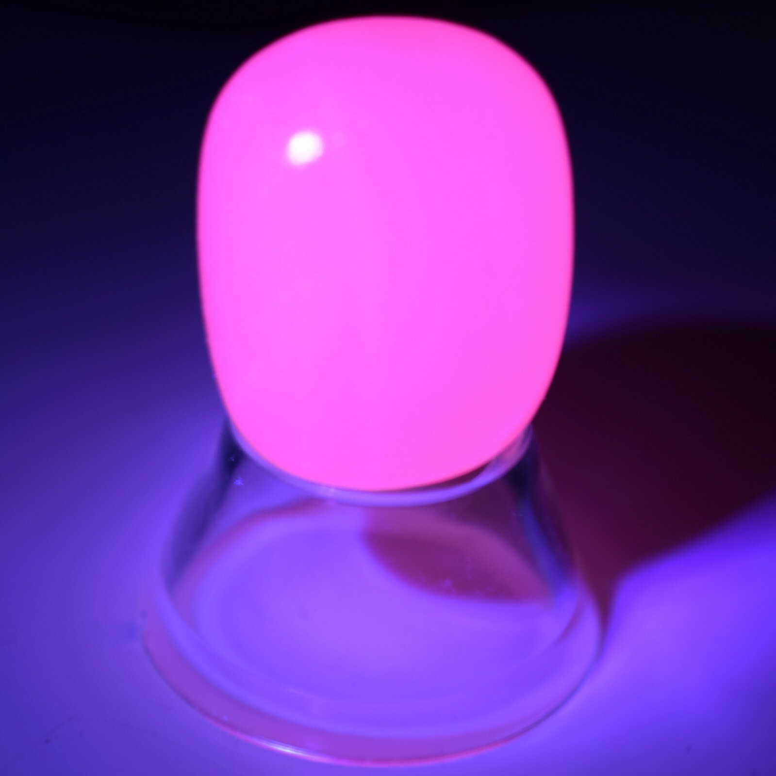 Charged Fluorescent Pink Mangano Calcite Crystal Tumble Stone with Acrylic Stand