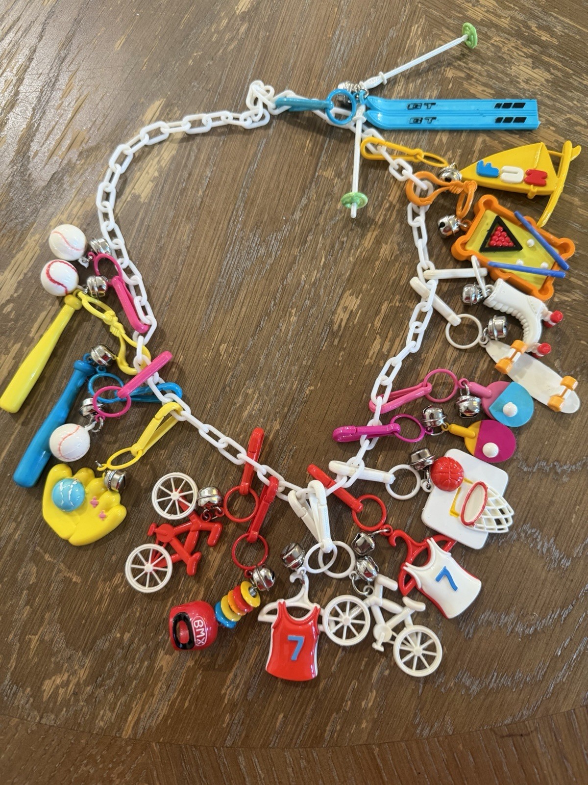 Lot Of 18 plastic All Sport Theme 80\'s chain necklace Bell Charms 1980s BMX Bike