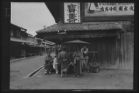 Photo:Japan 1908 street scene crowds shop signs buildings