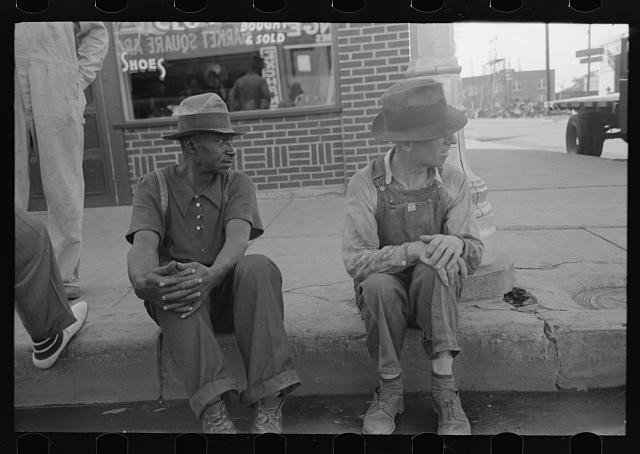 Photo:Muskogee Oklahoma 1939 Two Men Sitting on Curb Downtown FSA Photo