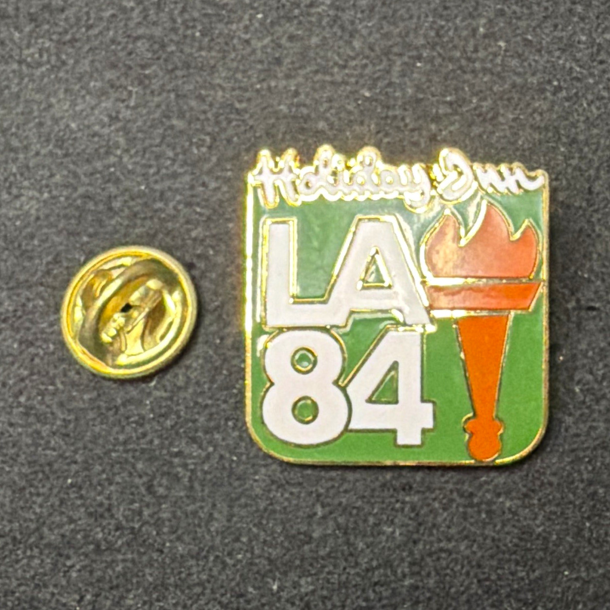 Vintage 1984 LA Olympics Holiday Inn LA84 Torch Sponsor Pin NIP