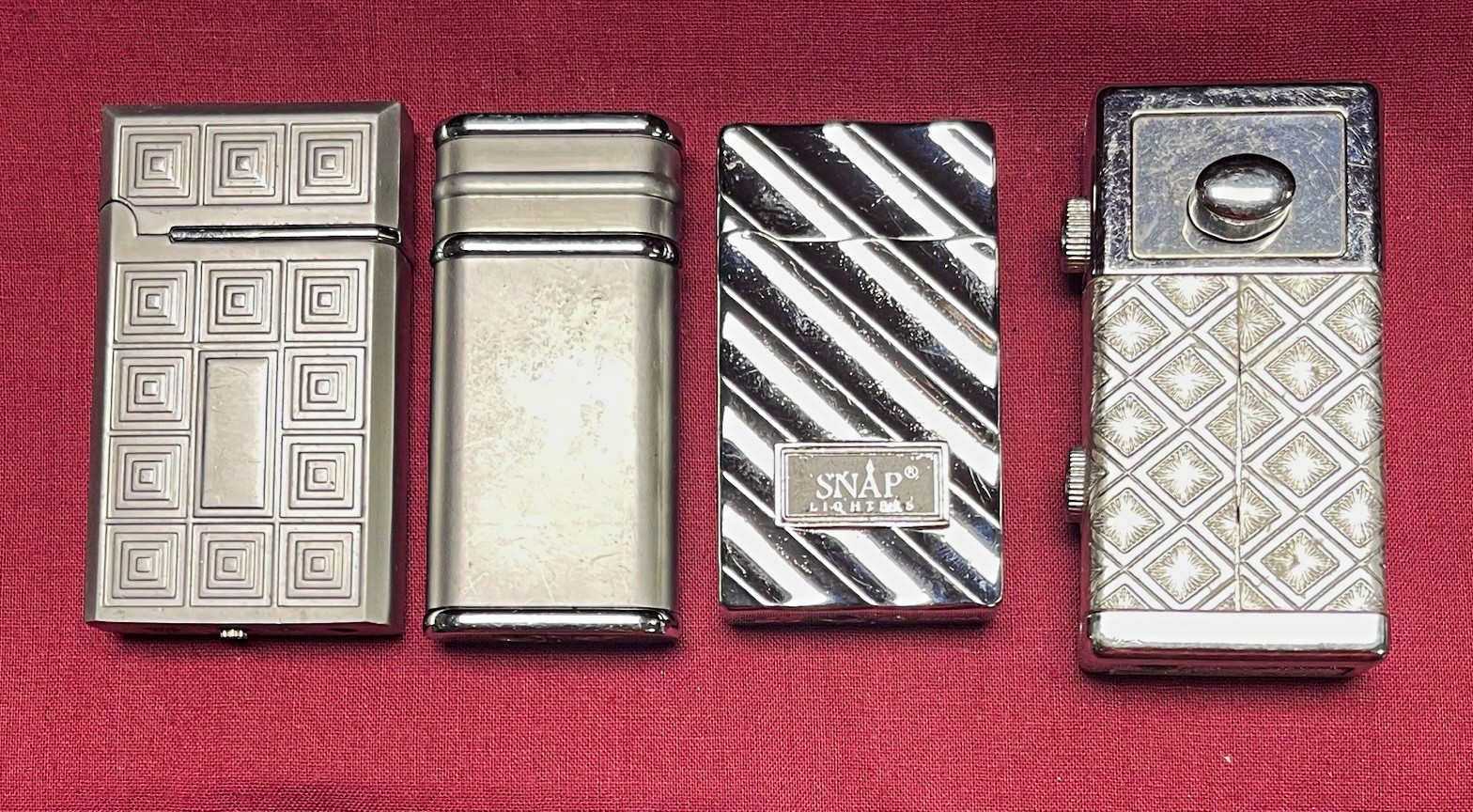 SNAP Collectible Pocket Lighters (4) Silver Tone Assorted Metal, 1 Marked