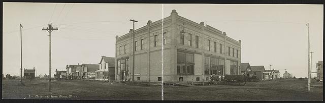 Photo:Gary Minnesota Unpaved Street Brick Building Horses Wagon c1908