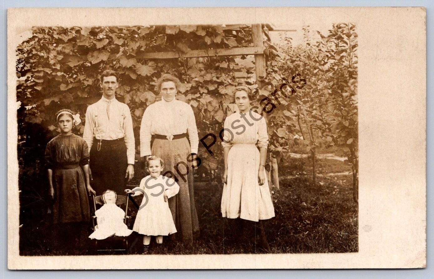 K60/ Interesting RPPC Postcard c1910 Family Child Toy Scary Doll Chair 458