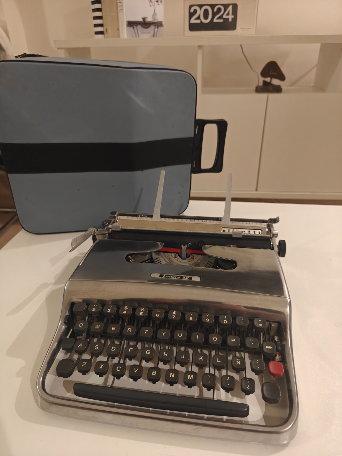 SILVER MCM. OLIVETTI LETTERA 22 TYPEWRITER . MOMA. SPANISH Ñ. PICA FONT. 1965