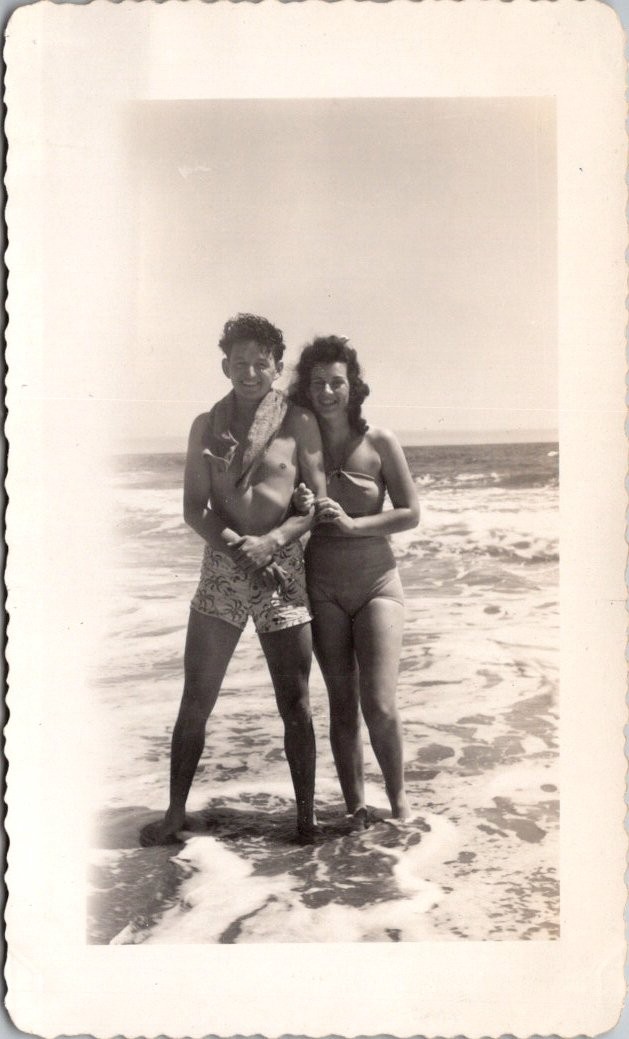 Smiling Couple Man Woman in Swimsuits Beach Ocean Photograph Snapshot Photo
