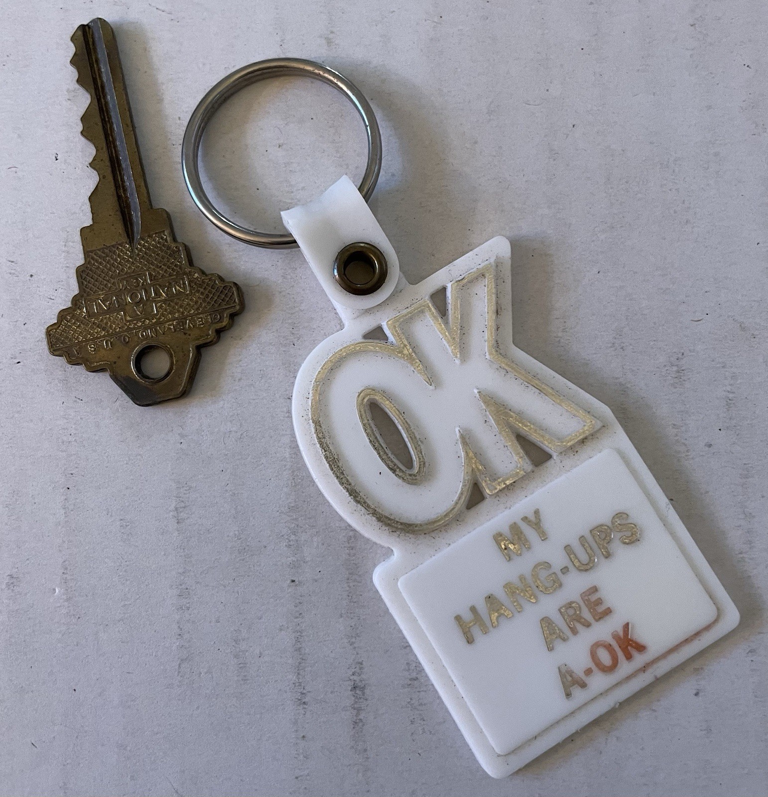 Vintage 70s “OK My Hang-Ups Are A-OK” White Keychain Plastic Key Ring Fob