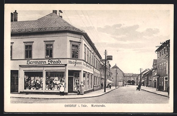 Postcard Ear Druf i. Thuringia, market street with fashion shop by Hermann Staab 