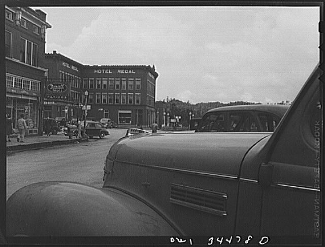Photo:Hotel Regal Street Scene Vintage Car 1940s Downtown Main Street