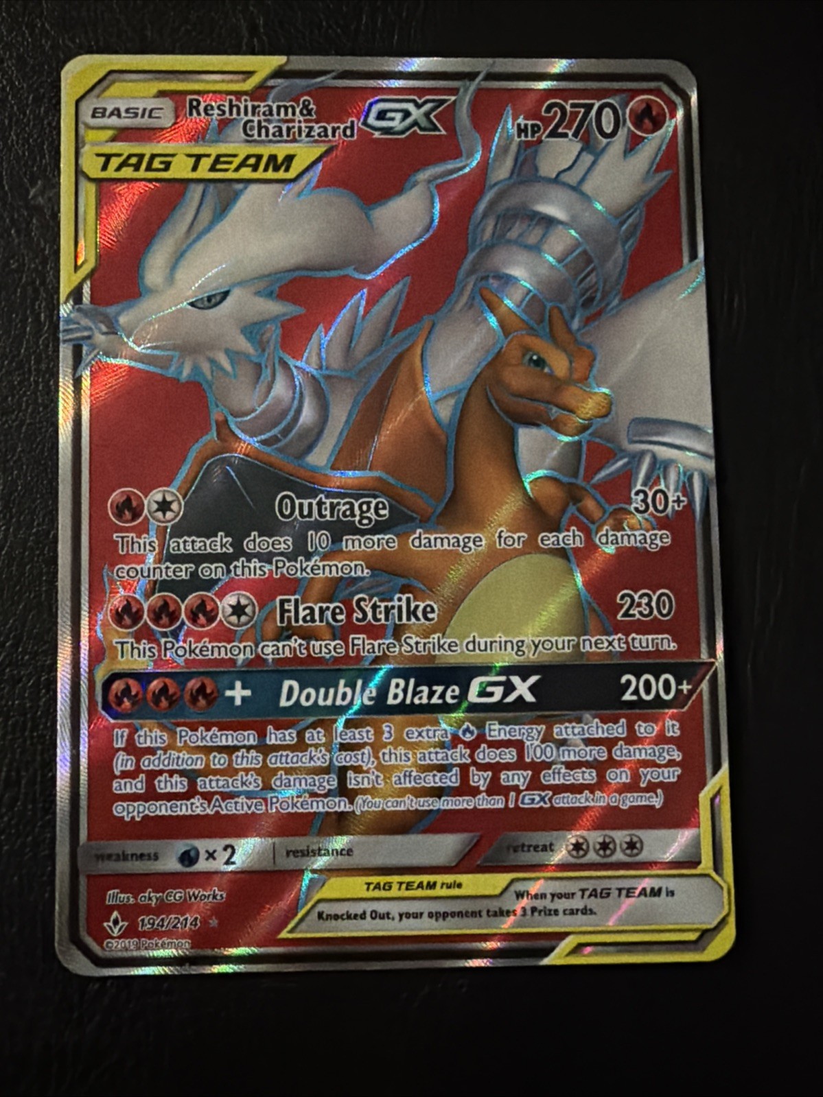 Reshiram & Charizard GX Full Art Holo Card 194/214 Sun and Moon Unbroken Bonds