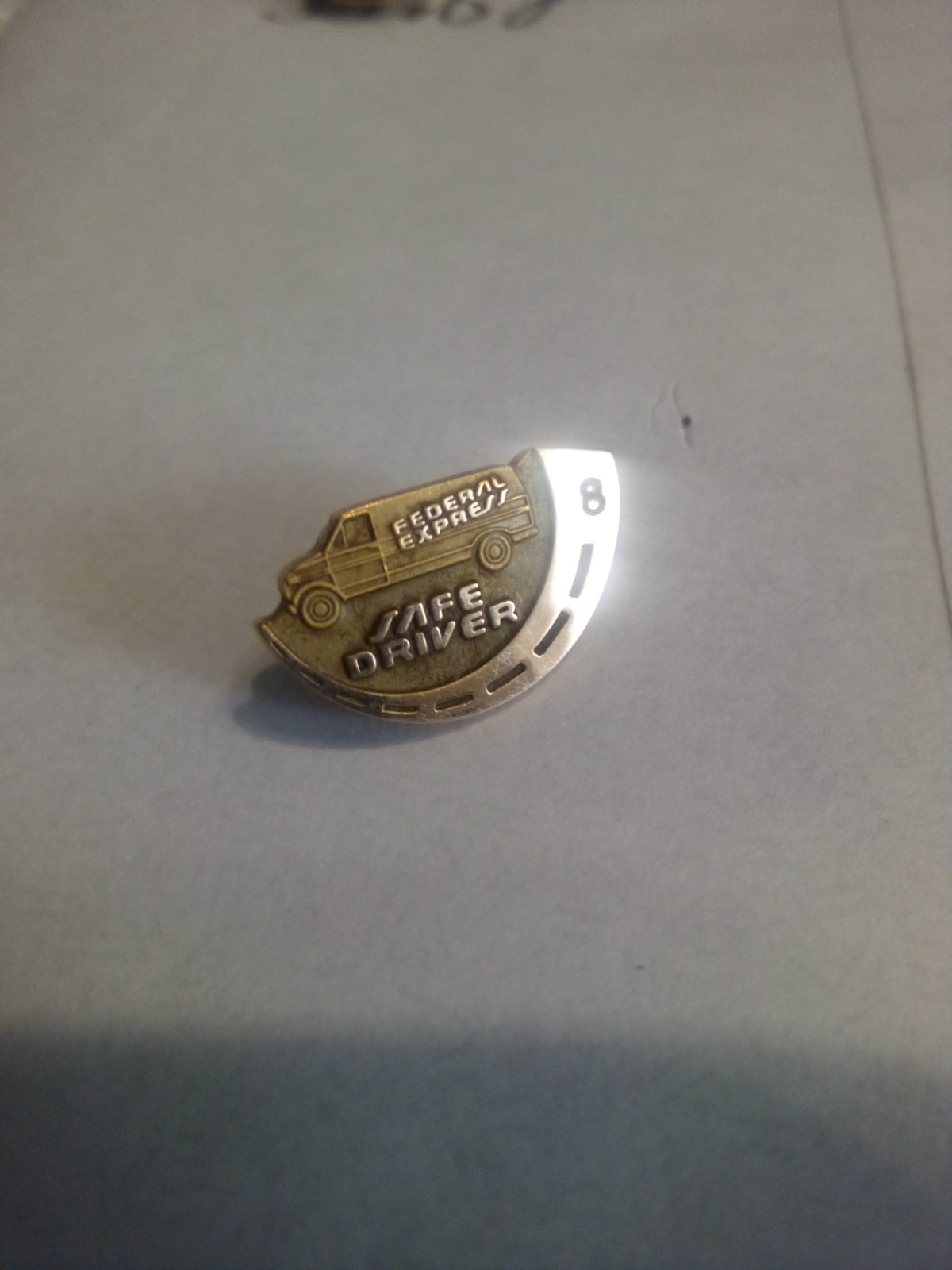 Vintage Federal Express Safe Driver milestone 8 lapel pin 10kt Solid Gold.