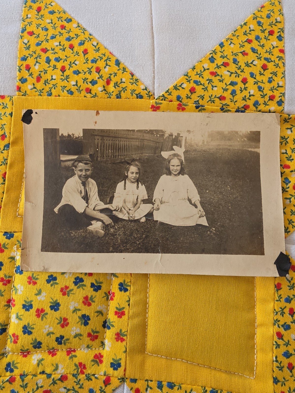 VTG Sepia Snapshot Photo 1910s Children Sitting In The Grass Yard Outside