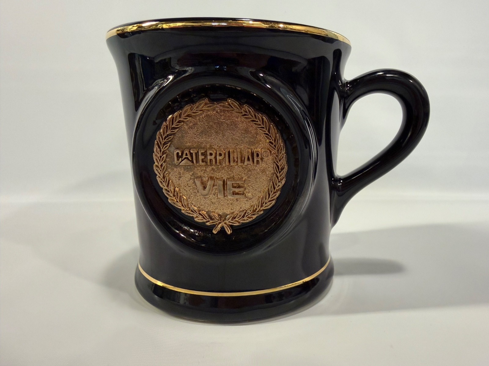 Vintage Caterpillar VIP Coffee Mug Black Gold Laurel Wreath Corporate CAT Cup