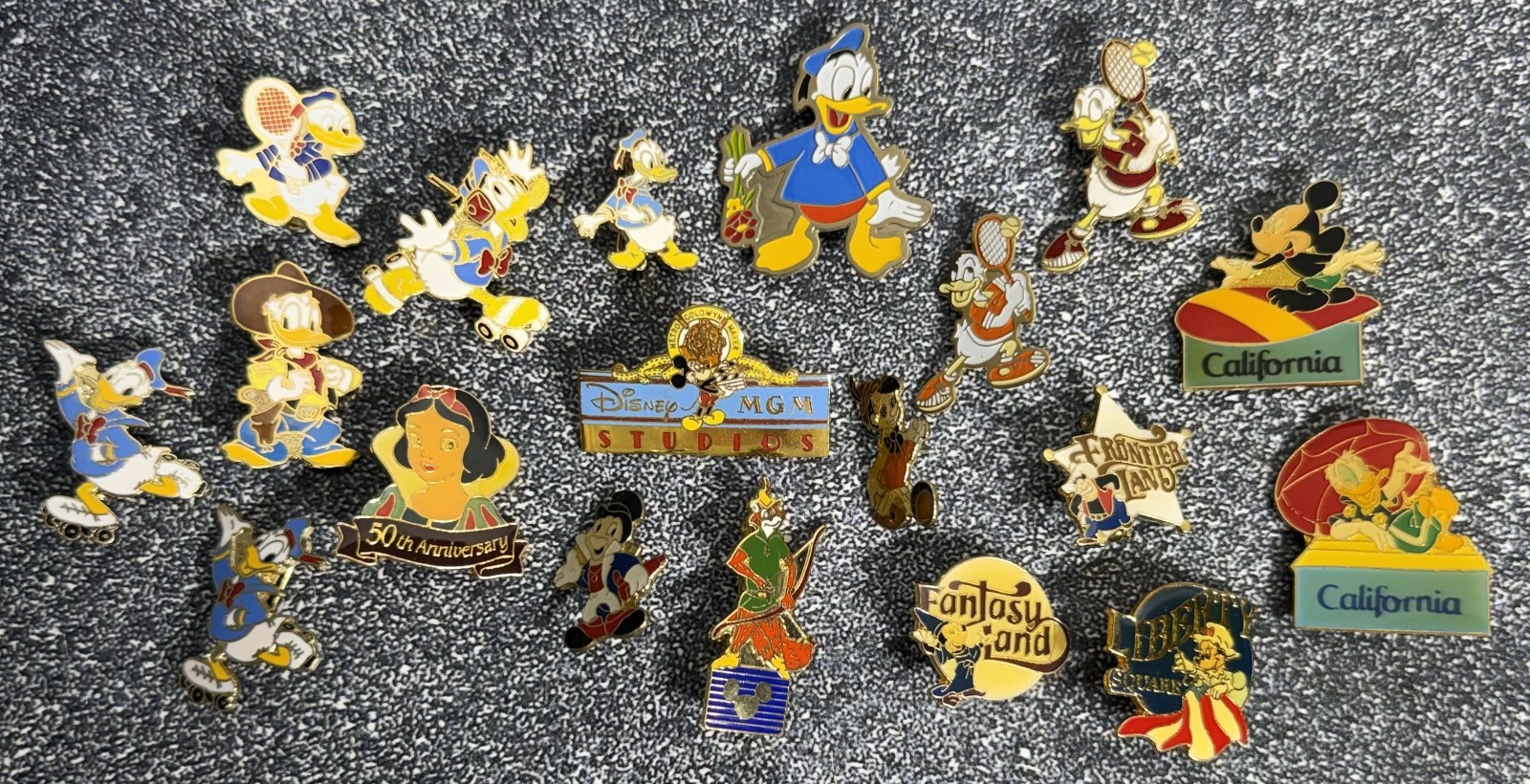 Lot of 19 Vintage Disney Pins - Donald, Mickey, MGM Studios, California, Lands
