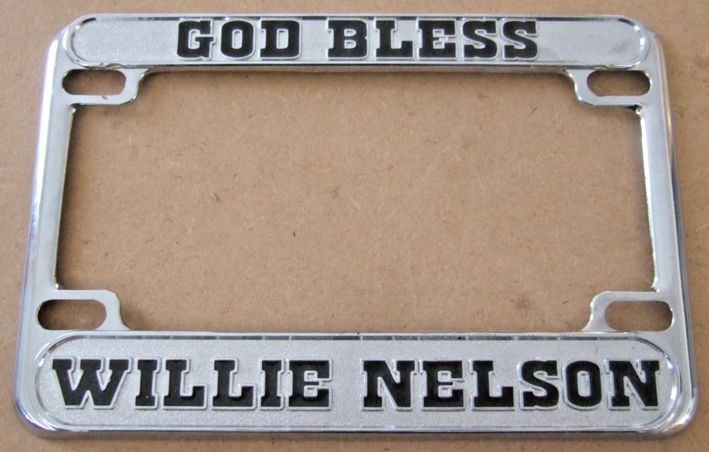 GOD BLESS WILLIE NELSON MOTORCYCLE  LICENSE PLATE FRAME    NICE CONDITION