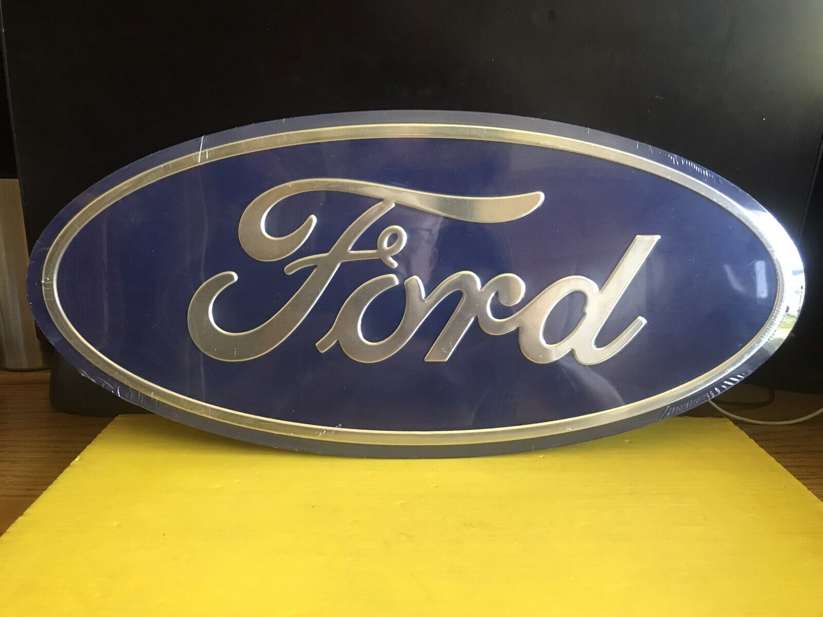 FORD BLUE OVAL METAL SIGN 9.25” TALL 20” LONG NEW WRAPPED PLASTIC FOR MANCAVE