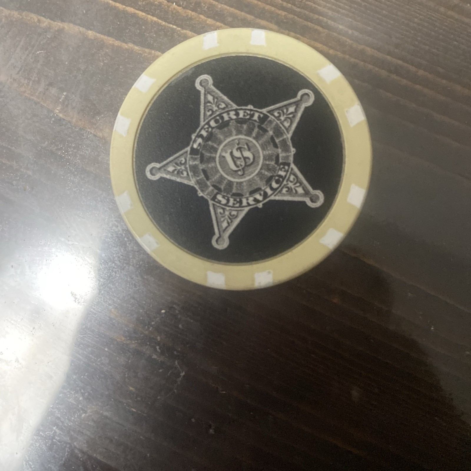 A Secret Service Poker Chip Challenge Coin.